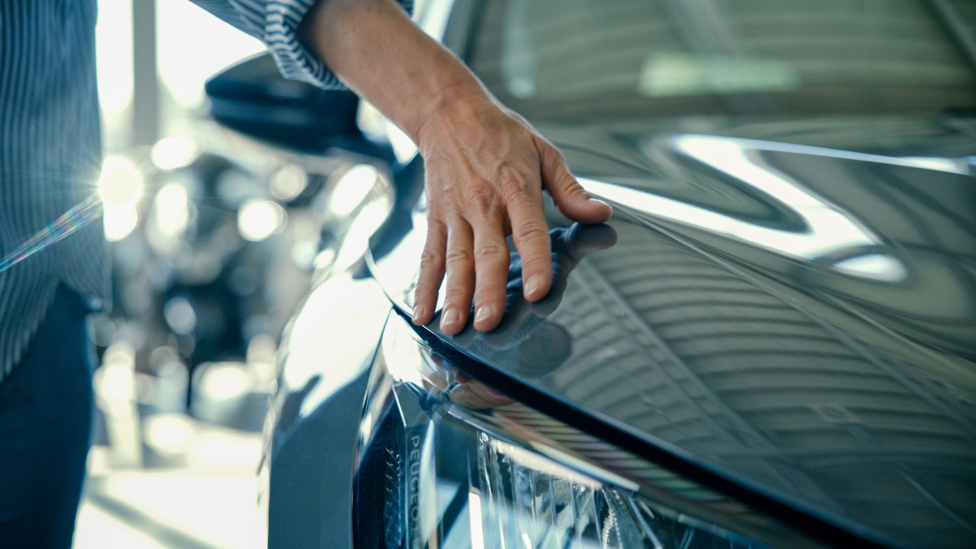 Female Customer Touching New Blue Suv Car at Store